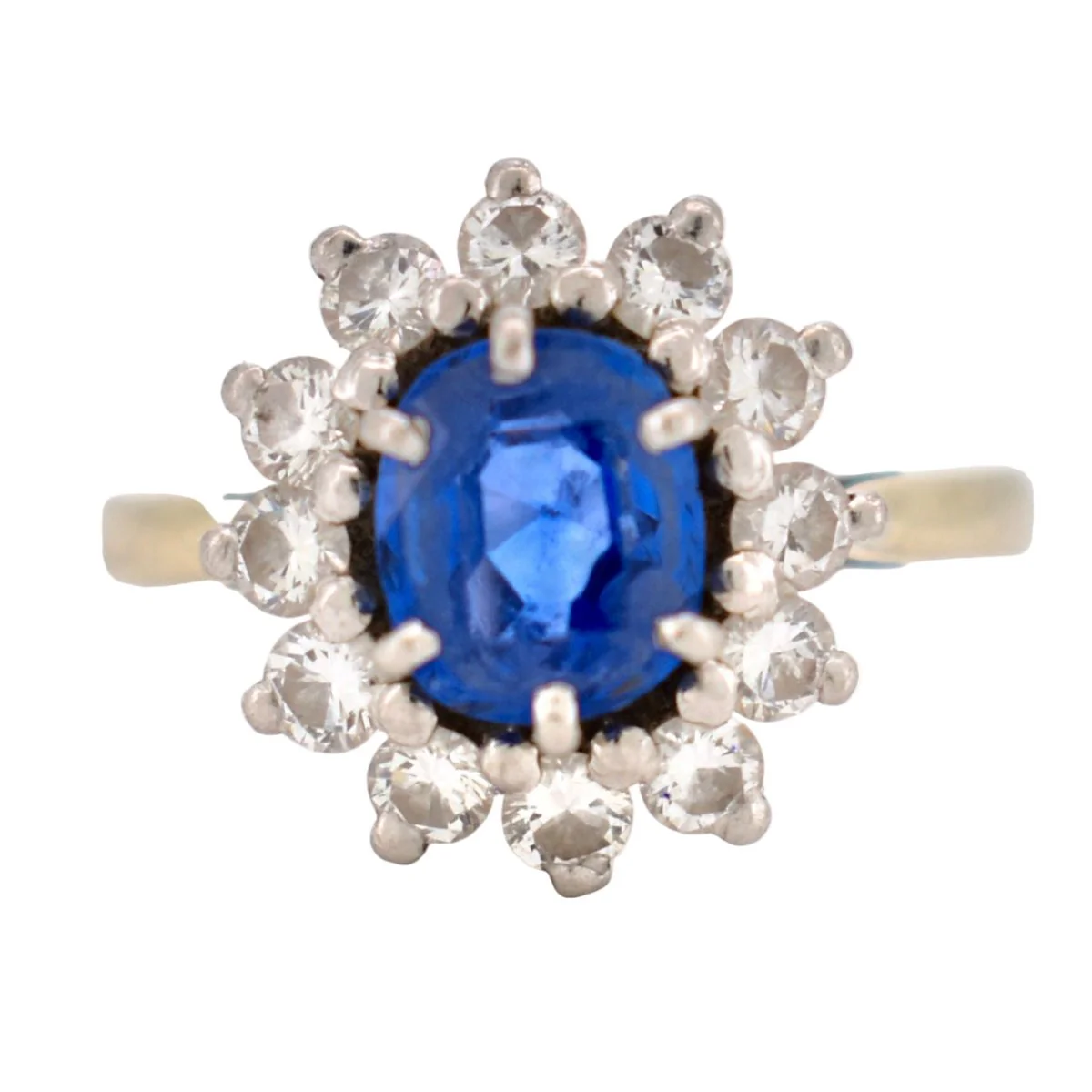 Daisy ring in white gold, platinum, sapphire and diamonds