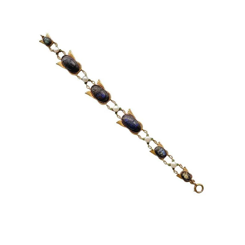 Egyptian revival bracelet, in 18k yellow gold set with 6 scarabs