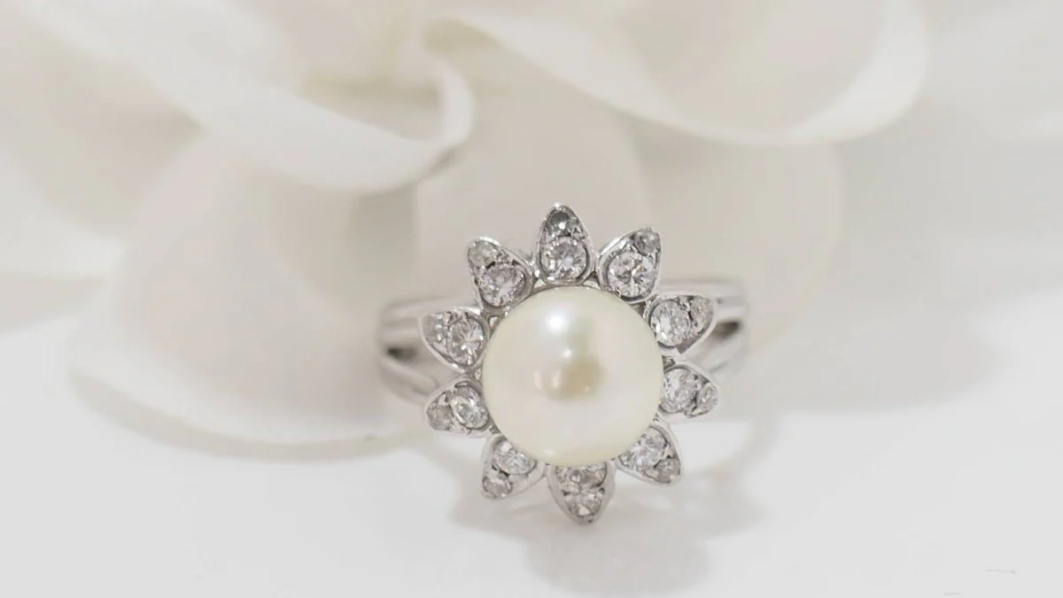 White gold, cultured pearl and diamond ring
