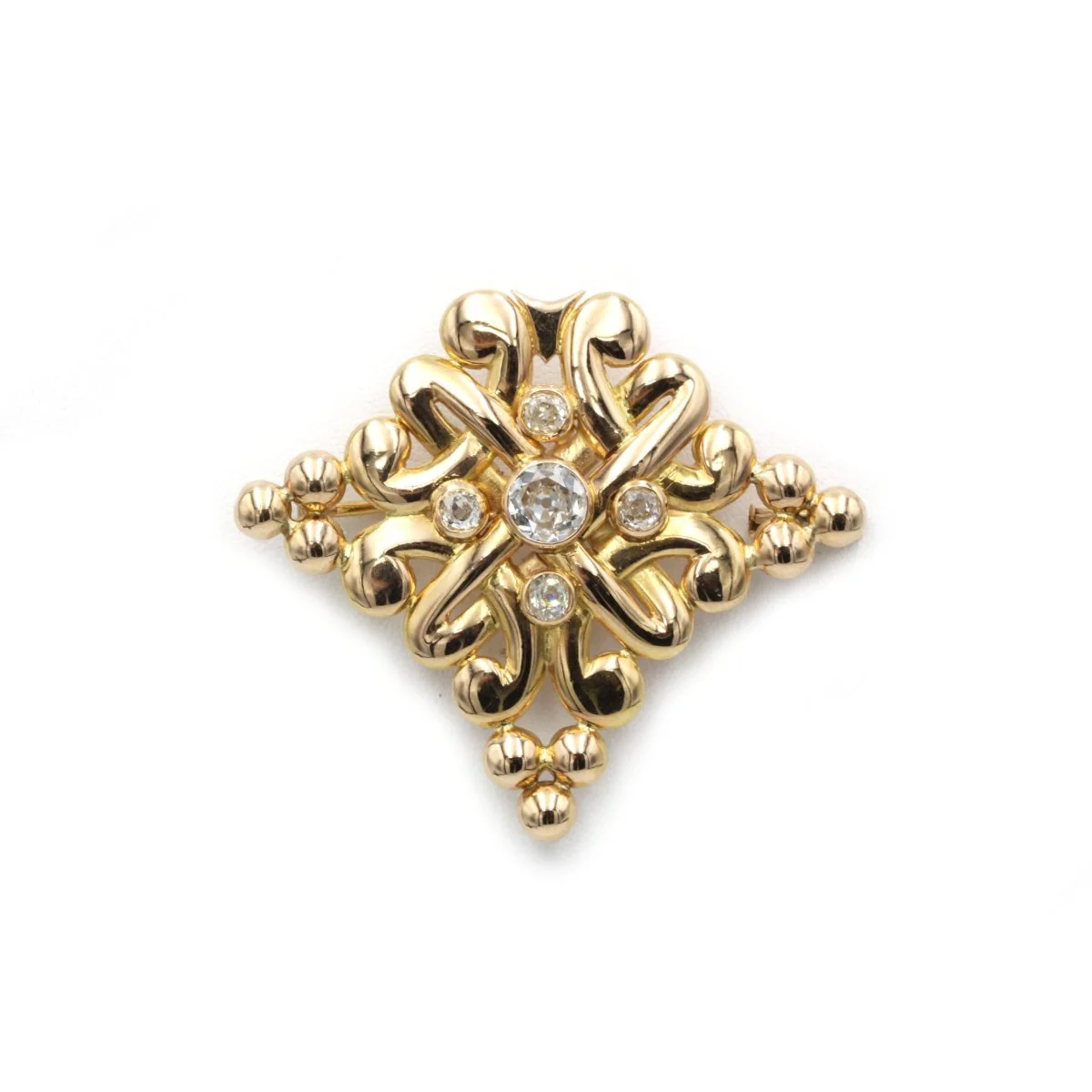 Brooch at yellow gold and diamonds