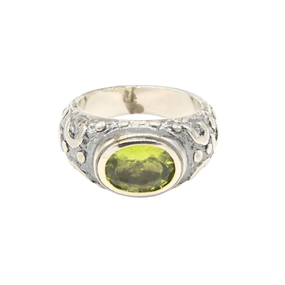 Ring Rush in yellow gold and silver and peridot