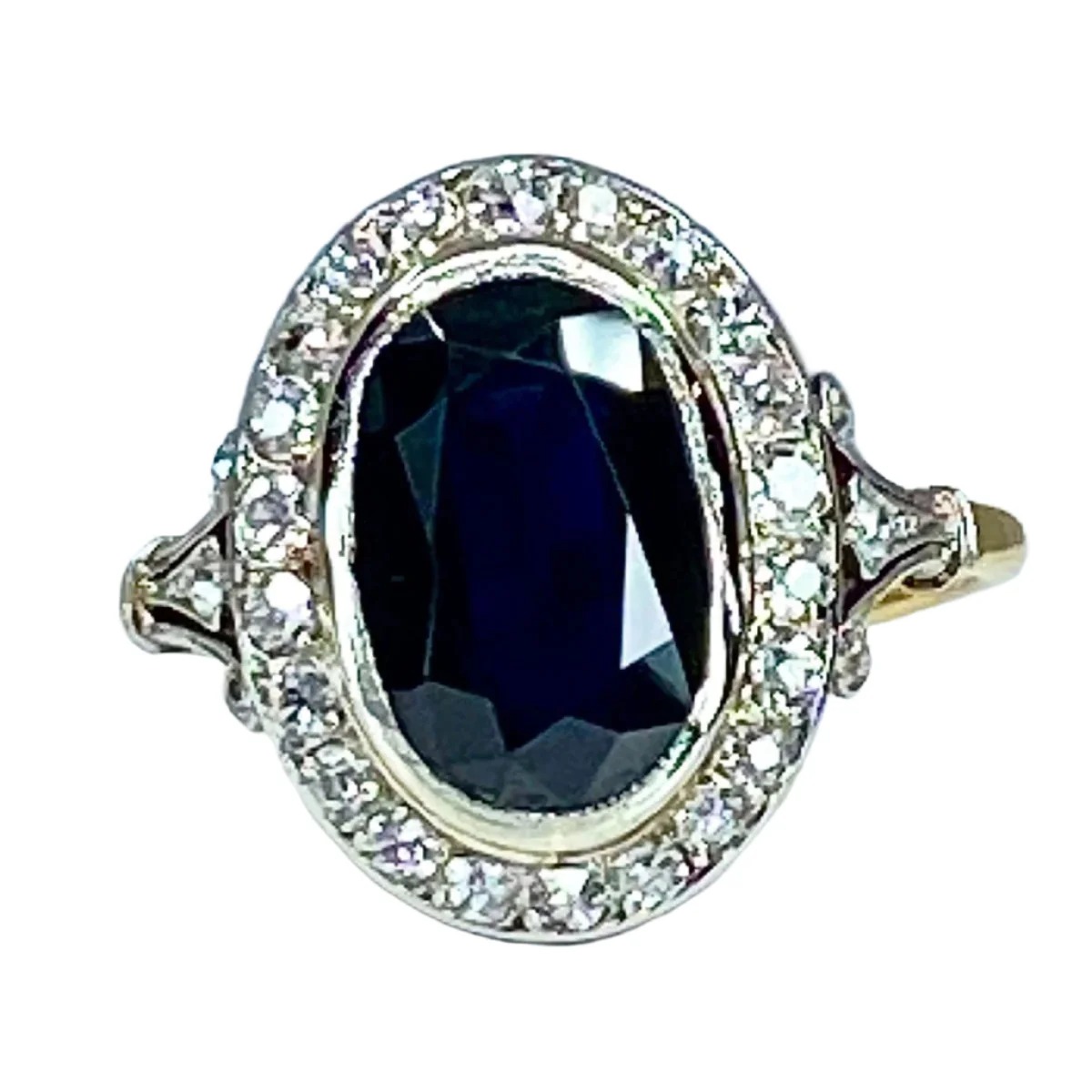 Ring in yellow gold, white gold, sapphires and diamonds