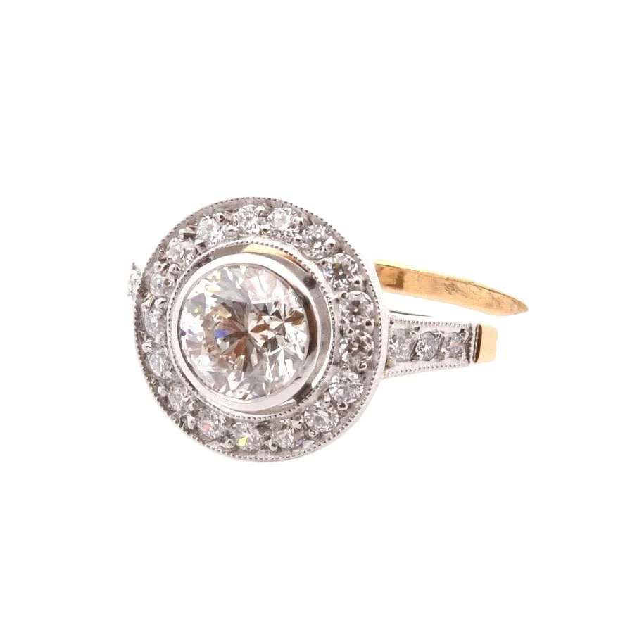 Entourage ring in platinum, yellow gold, and diamonds