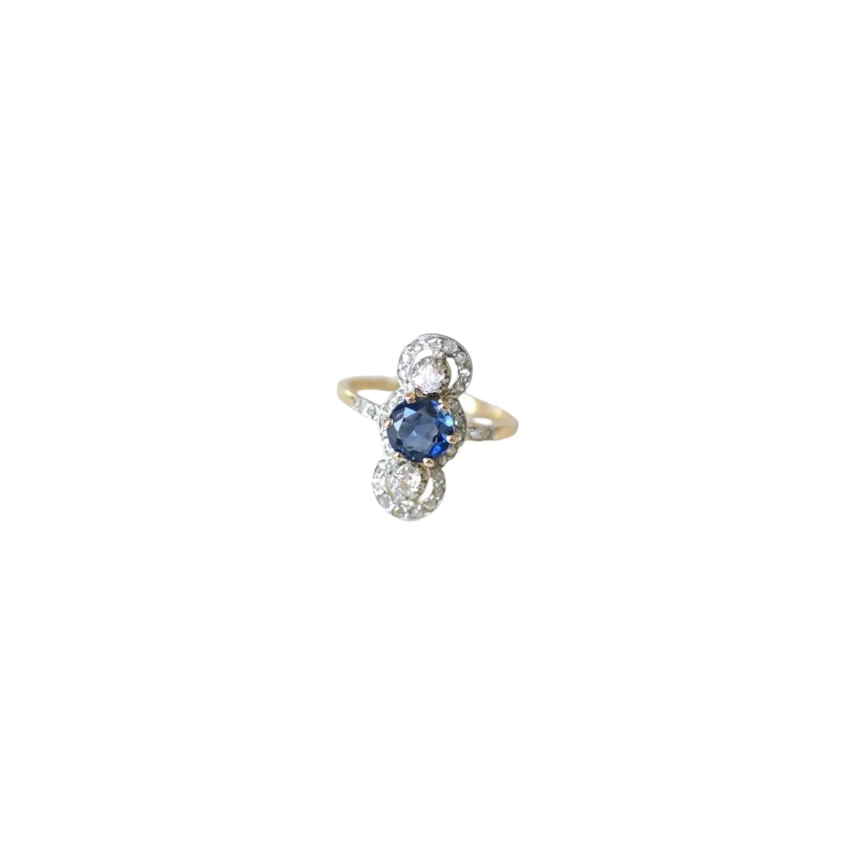Ring at yellow gold, paltinium, sapphire and diamonds