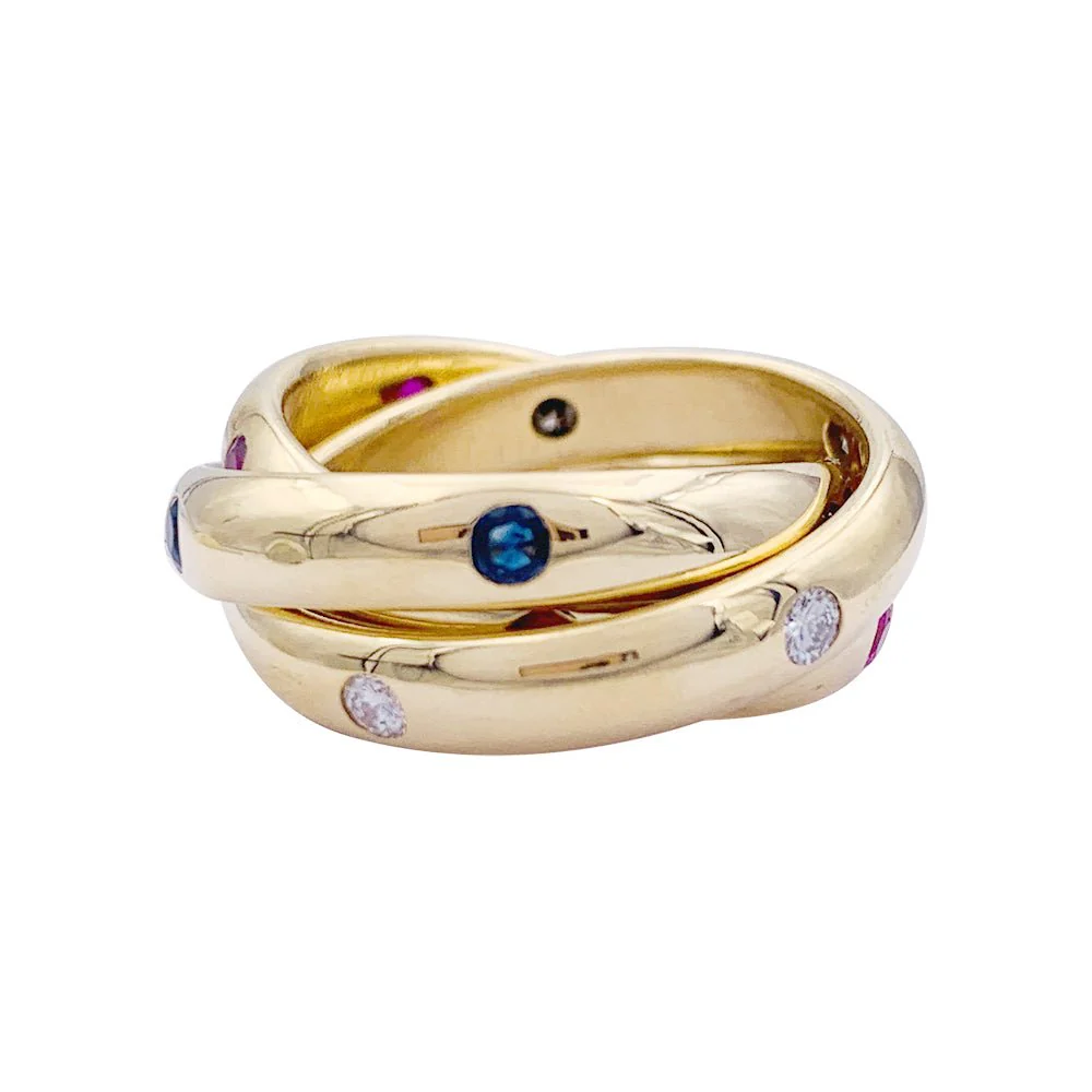 CARTIER "Constellation" ring in yellow gold with sapphires, rubies and diamonds