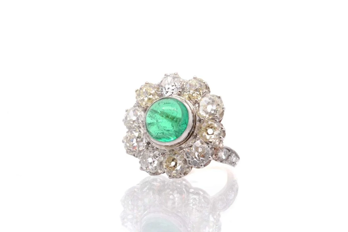 Emerald cabochon and diamond ring