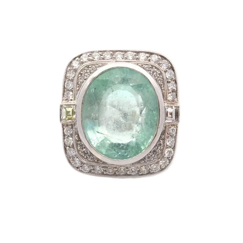 Ring Surroundings in paltinium, emerald and diamonds