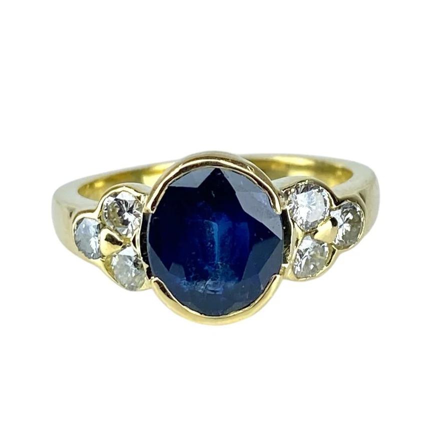 Ring in yellow gold 18 carats, sapphire and diamonds