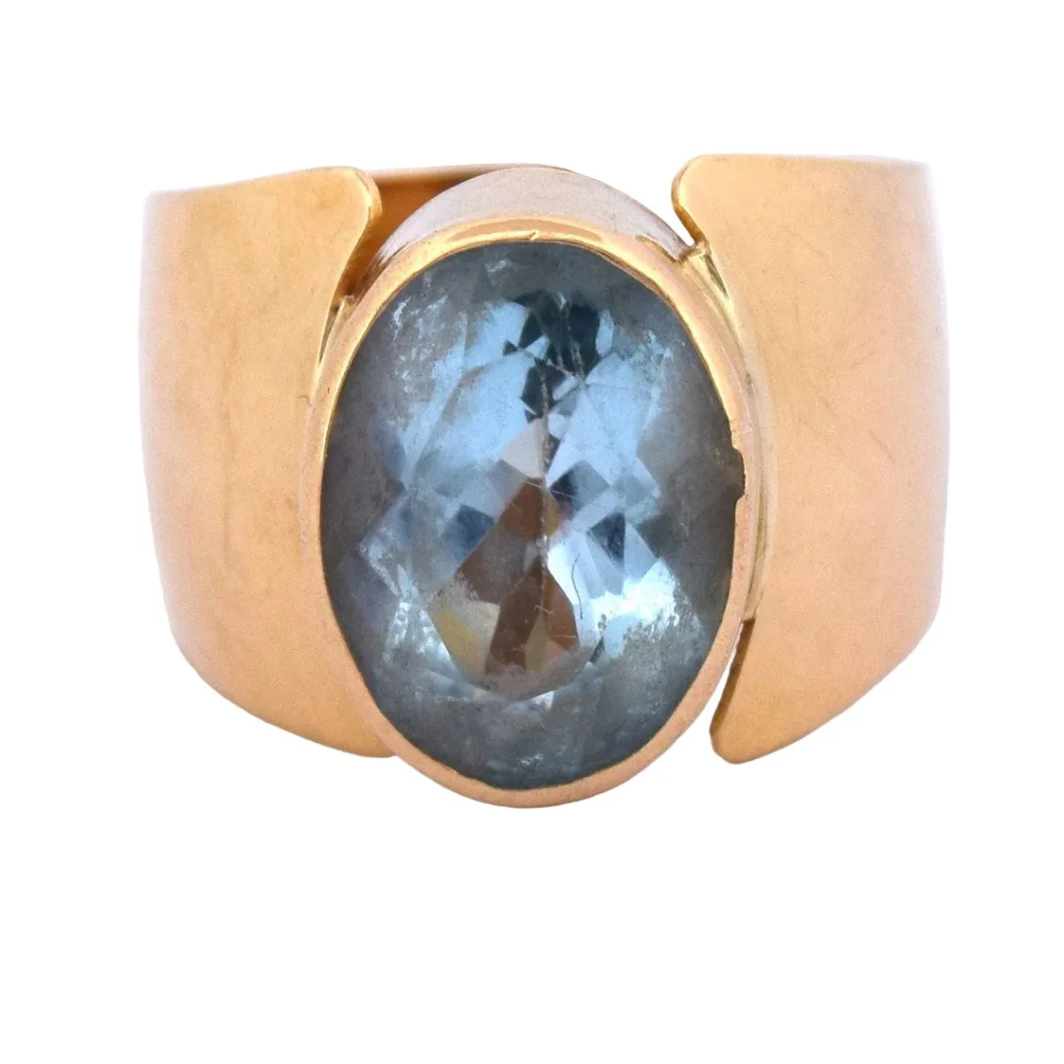 Ring in yellow gold and topaz