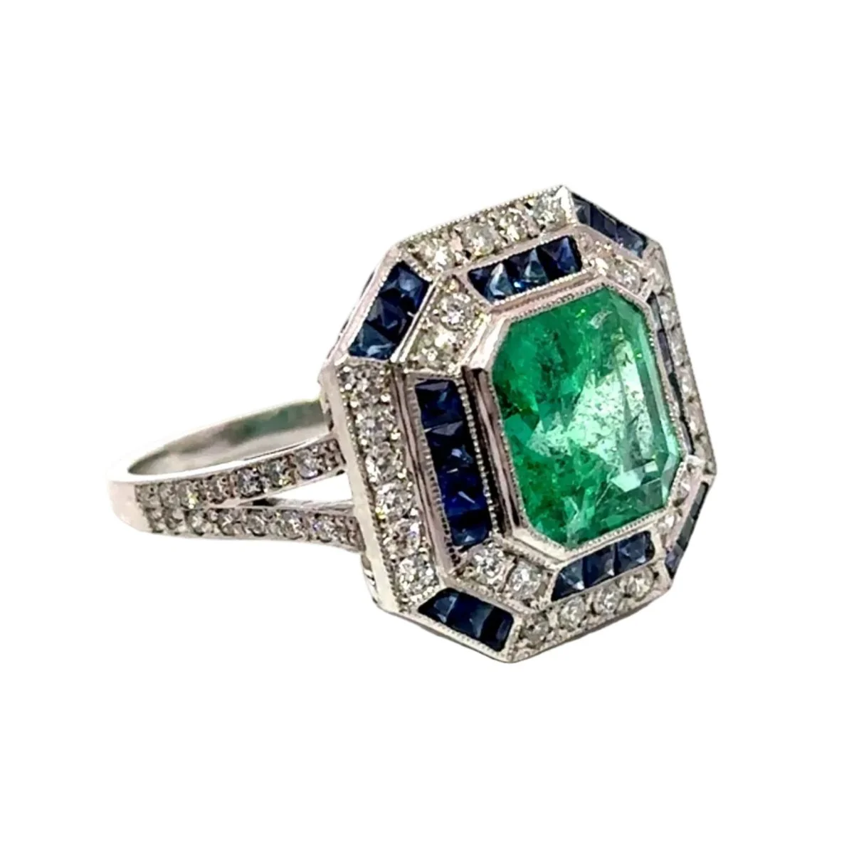 Entourage Ring in white gold, emerald, sapphire, and diamonds - Image 5