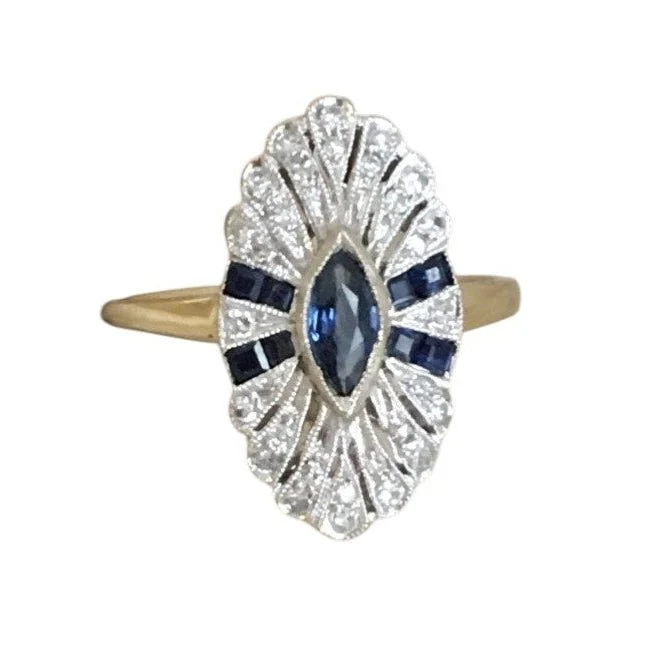Entourage ring in yellow gold, platinum, sapphire and diamonds