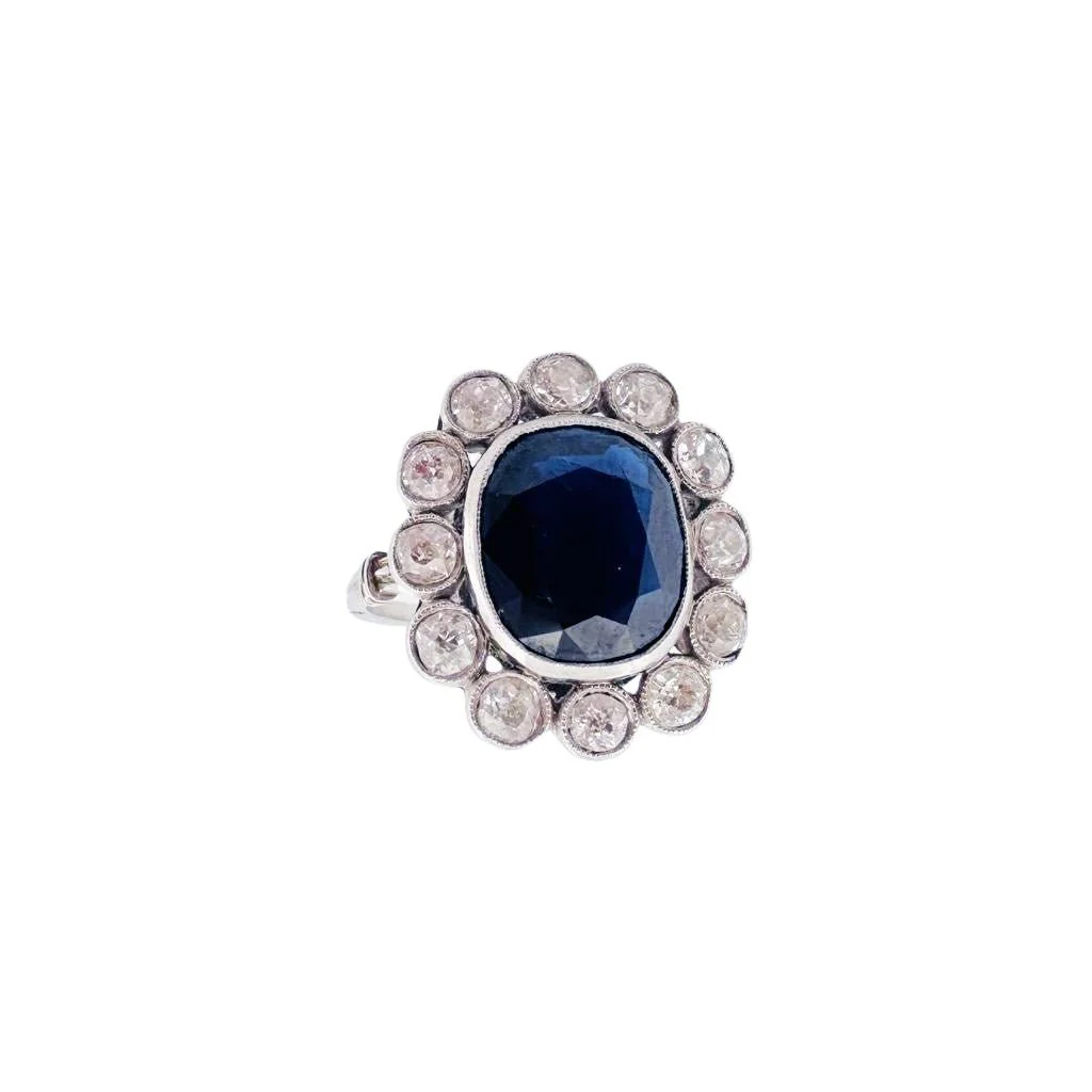Marguerite ring in platinum, white gold, sapphire and diamonds