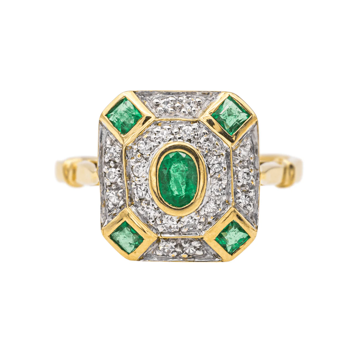 Ring at yellow gold, white gold, emeralds and diamonds
