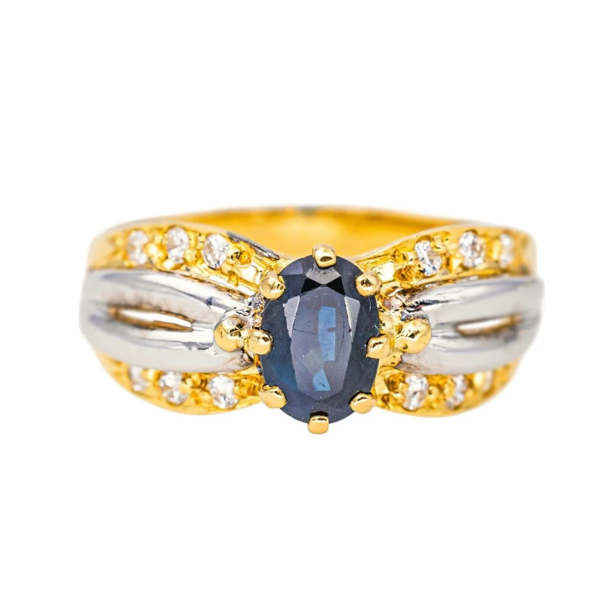 Ring in white gold, yellow gold, sapphire and diamonds