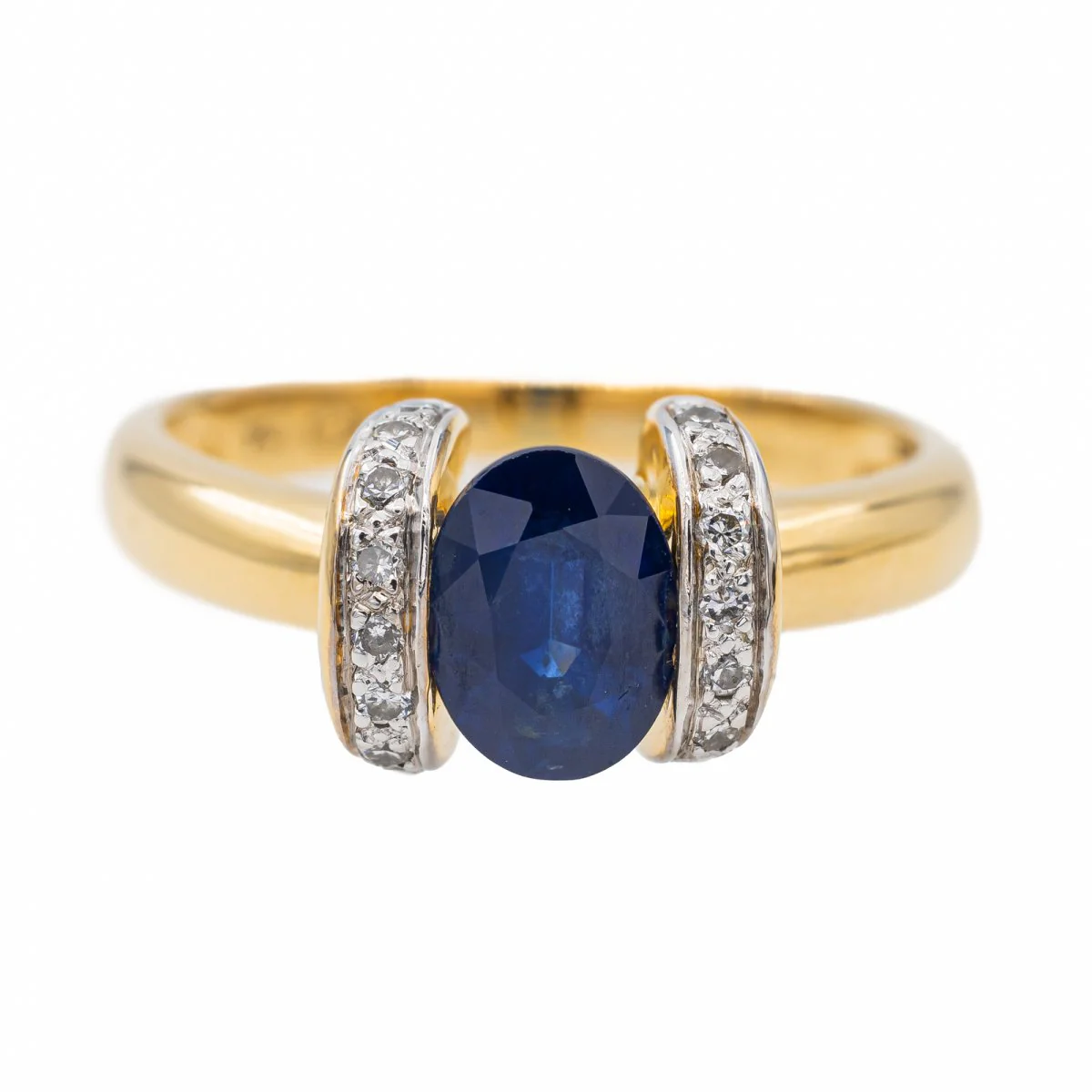 Ring in yellow gold and white gold, sapphire and diamonds