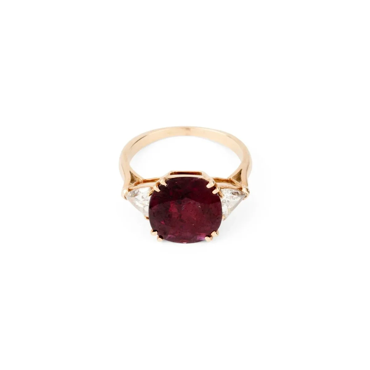 Oval ruby ring set with two triangle diamonds