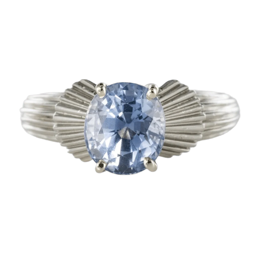 Solitaire ring in white gold, platinum and sapphire