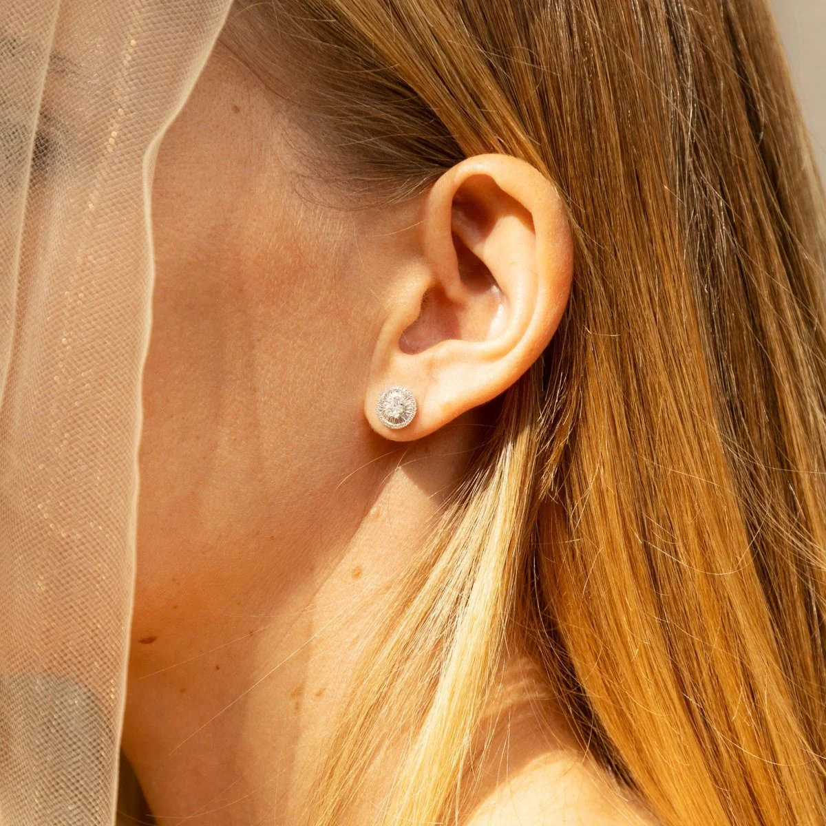 White Gold and Diamond Stud Earrings - Image 2
