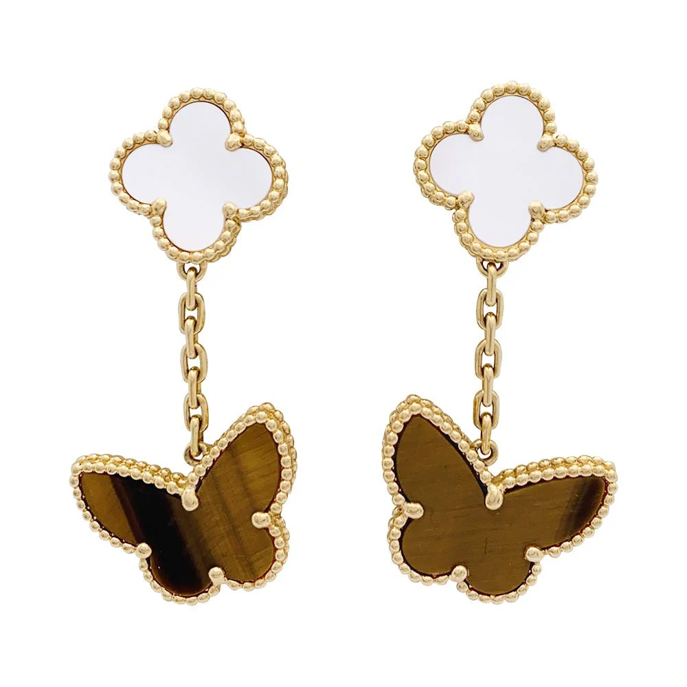 VAN CLEEF & ARPELS “Lucky Alhambra” earrings in yellow gold, white mother-of-pearl, tiger’s eye