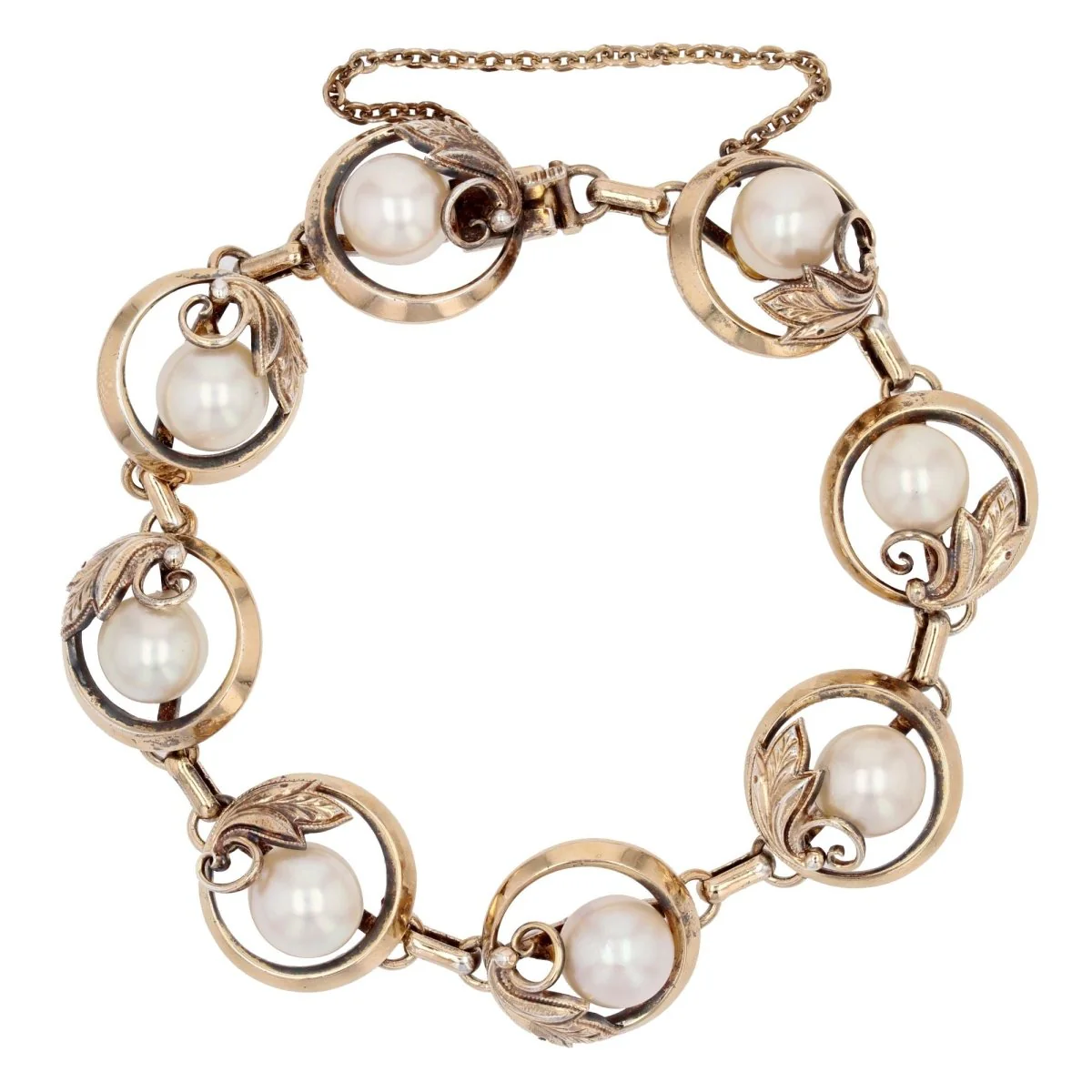 Charm bracelet in yellow gold, vermeil, silver and pearl