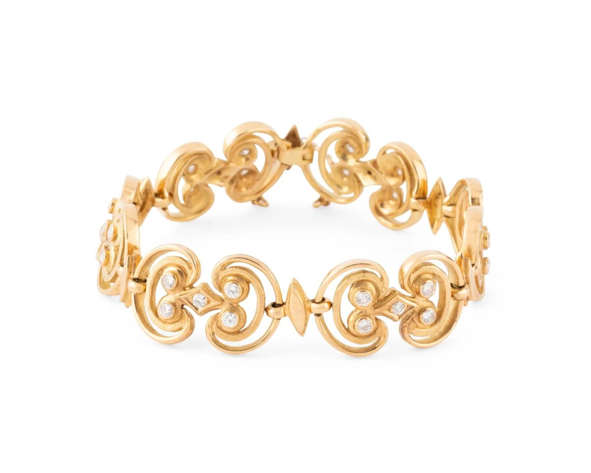 Bracelet at yellow gold and diamonds