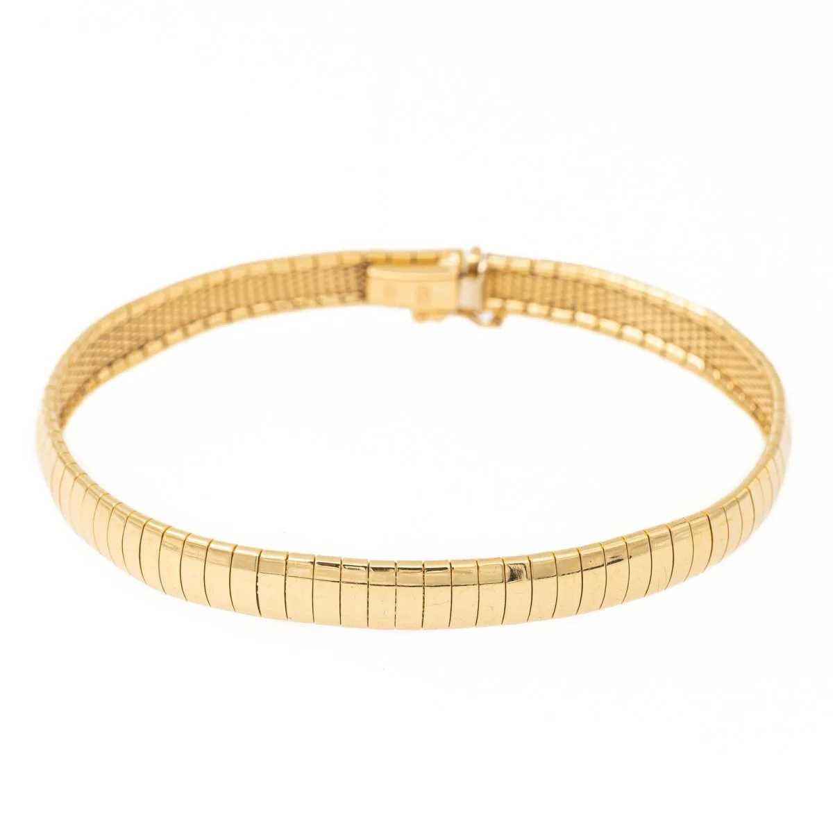 Omega mesh bracelet in yellow gold