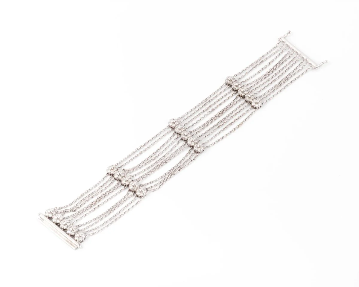 White gold and diamond bracelet on a filed força chain alternating with 4 patterns with flowers - Image 2
