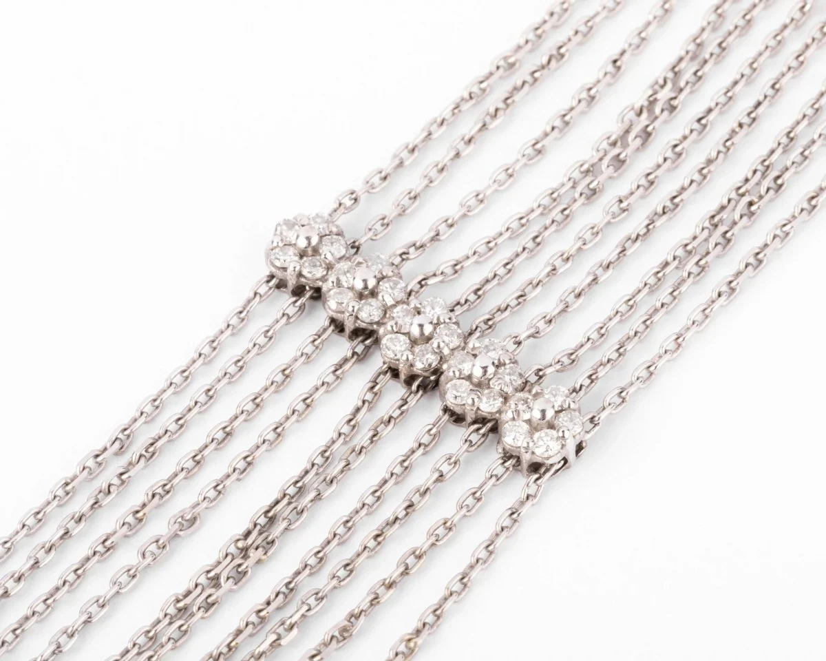 White gold and diamond bracelet on a filed força chain alternating with 4 patterns with flowers - Image 3