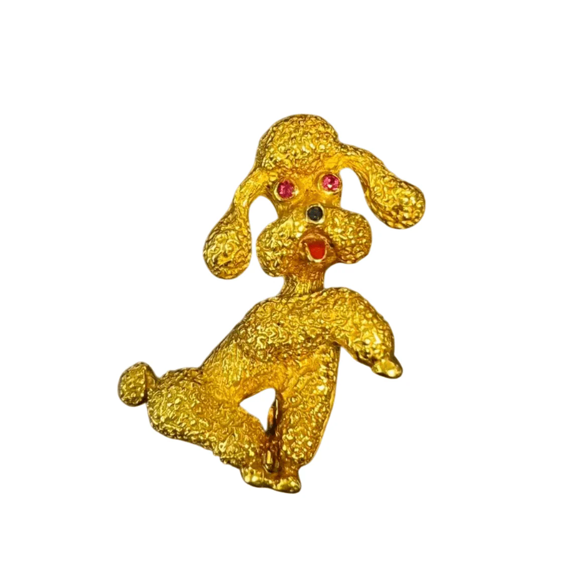 Brooch in yellow gold and ruby