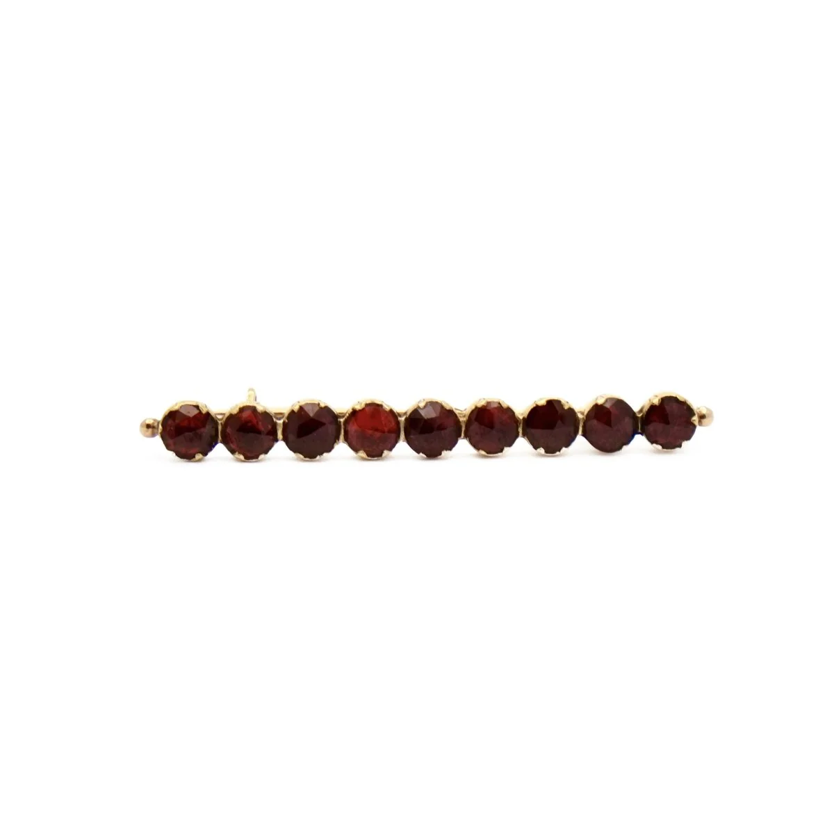 Brooch at yellow gold and almandine garnets