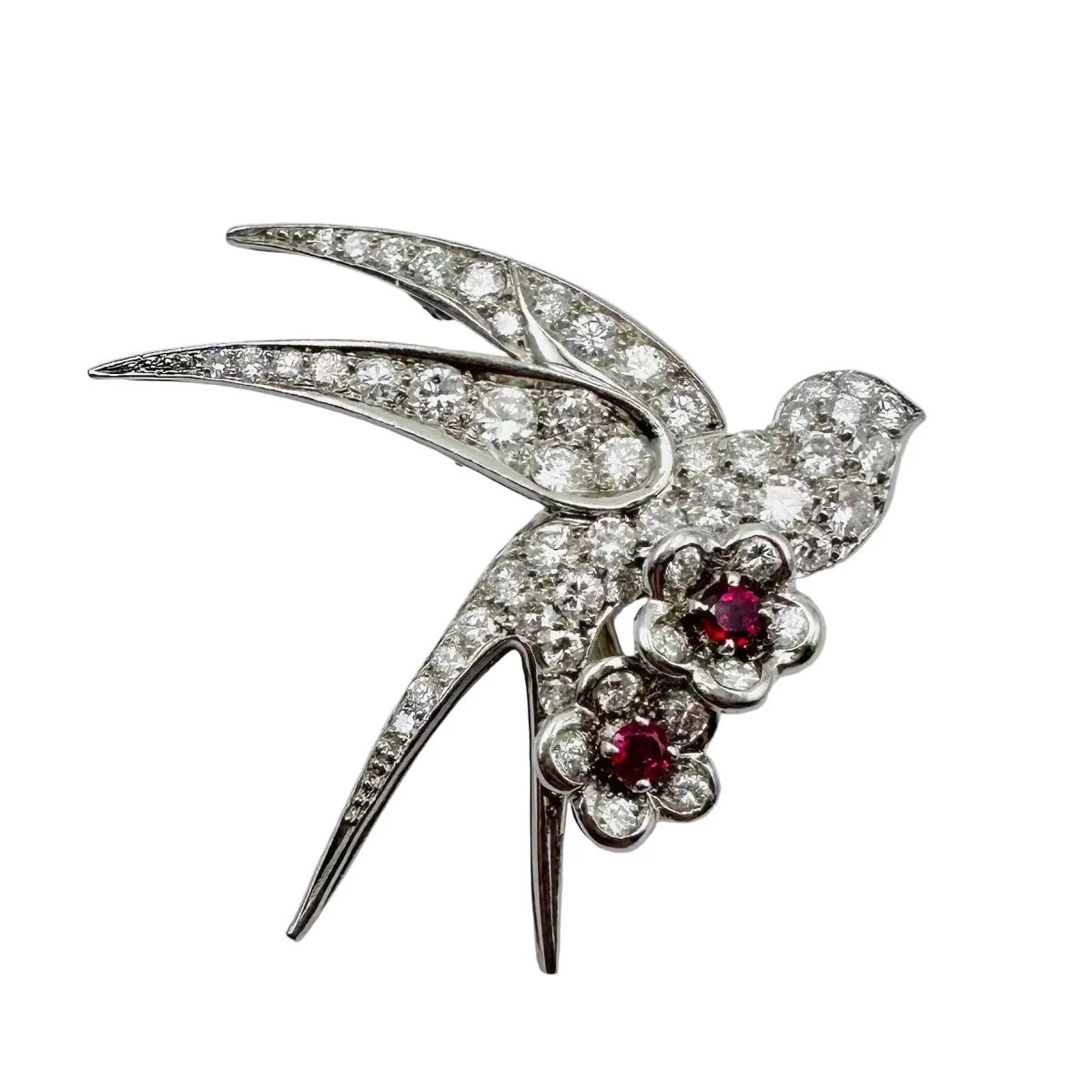 Brooch "Bird on two flowers" in white gold and Platinum