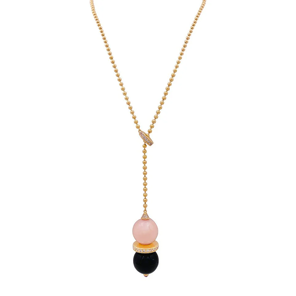 CARTIER “Evasion Joaillière” tie necklace in pink gold, opal, onyx, sapphire and diamonds