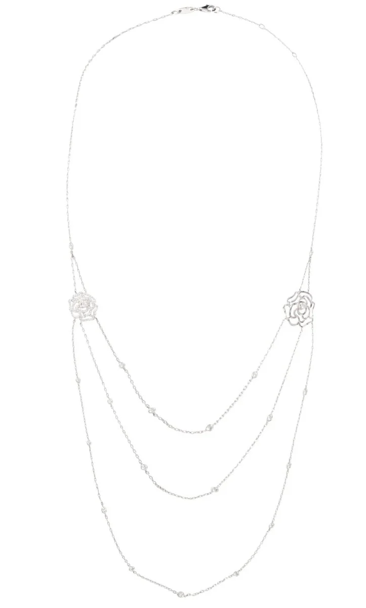 White gold necklace with diamond flower motifs