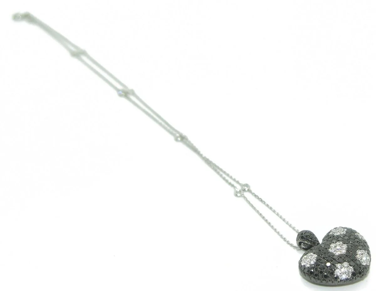 Necklace adorned with a black and white diamond heart pendant - Image 3