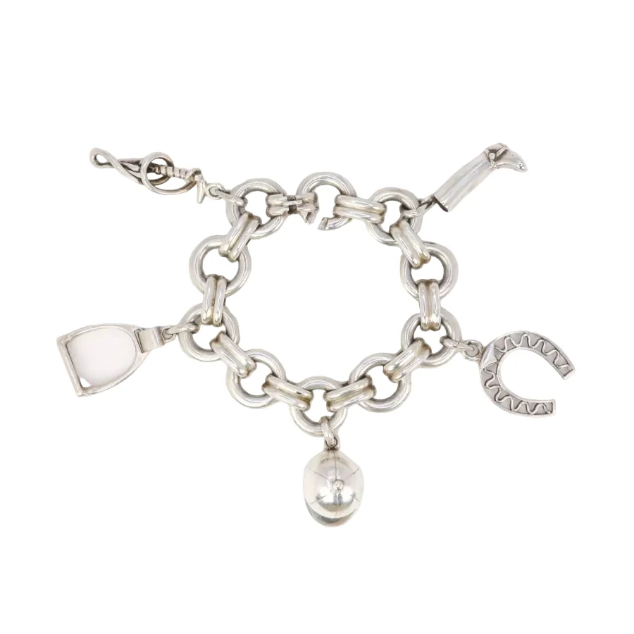 Gaétan de Percin (attributed to HERMES) Silver bracelet and horse-racing theme charms
