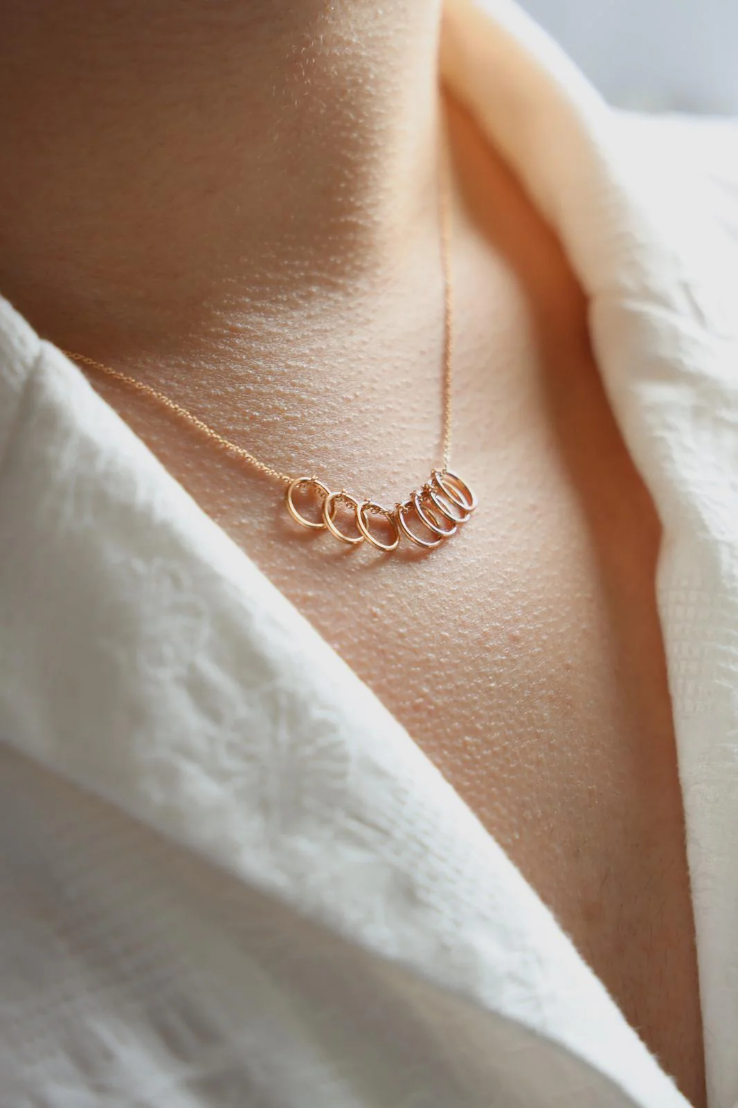 Ginette NY Necklace Tiny Seven Circles Rose gold - Image 2
