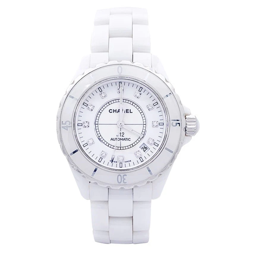 CHANEL “J12” white ceramic and diamond watch.
