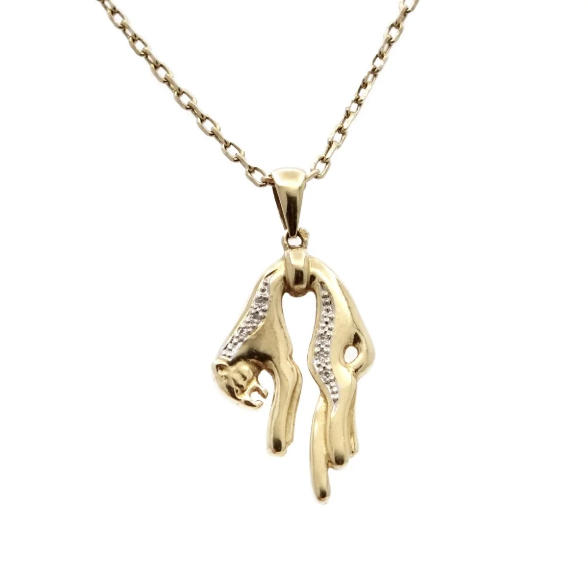 Soft panther pendant in yellow gold and diamond