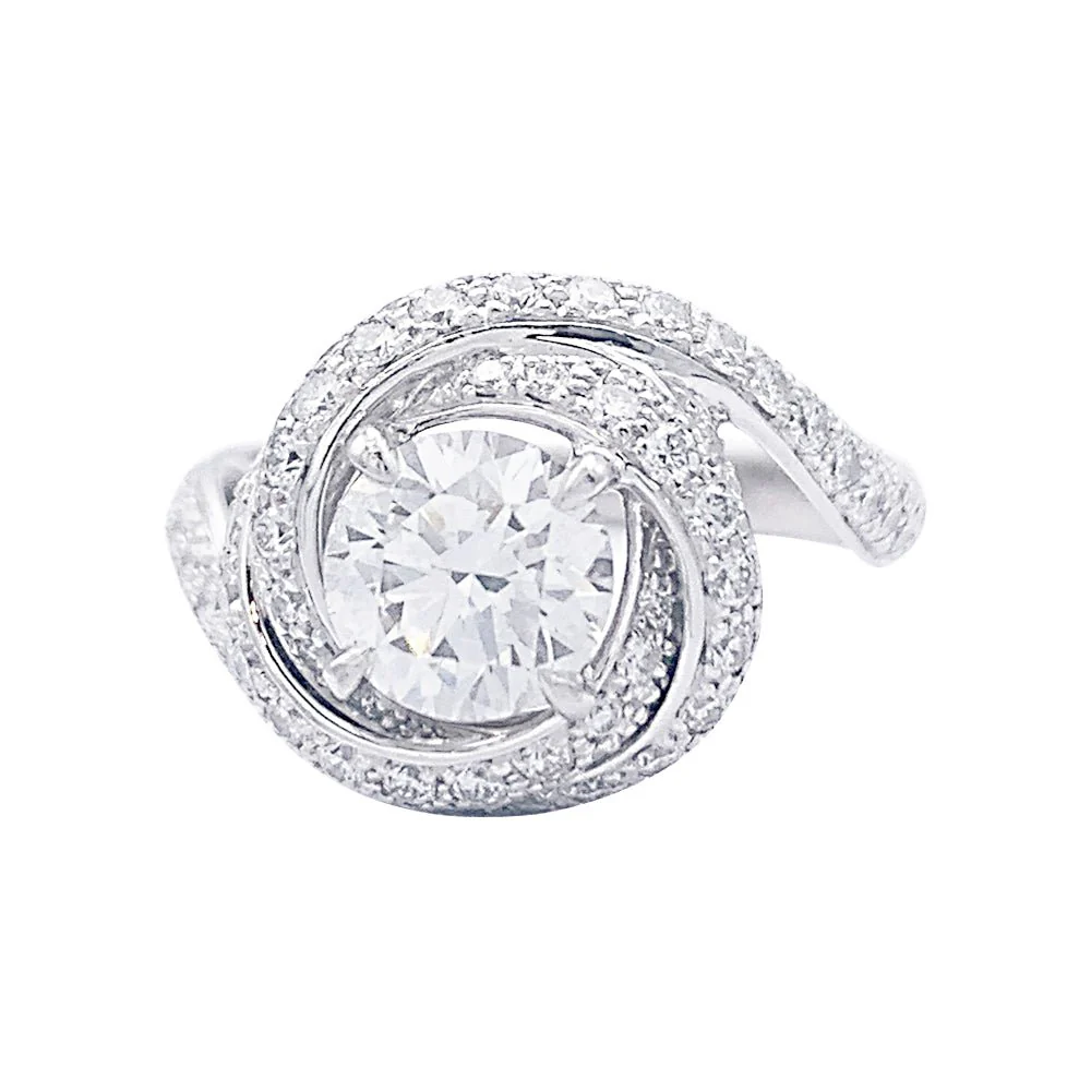 Cartier solitaire, “Trinity Ruban”, platinum and diamonds.